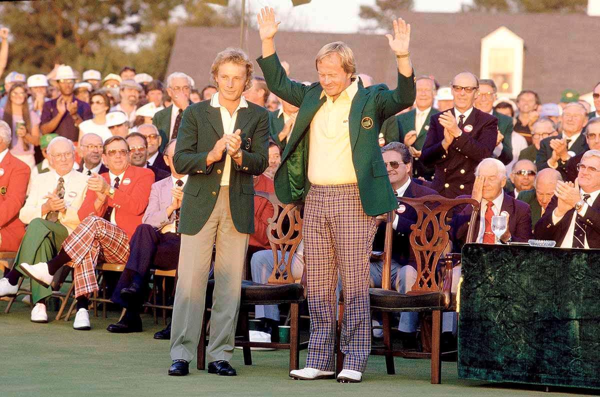 Bernhard Langer presents Jack Nicklaus with a Green Jacket for winning The Masters Bernhard Langer presents Jack Nicklaus with a Green Jacket for winning The Masters